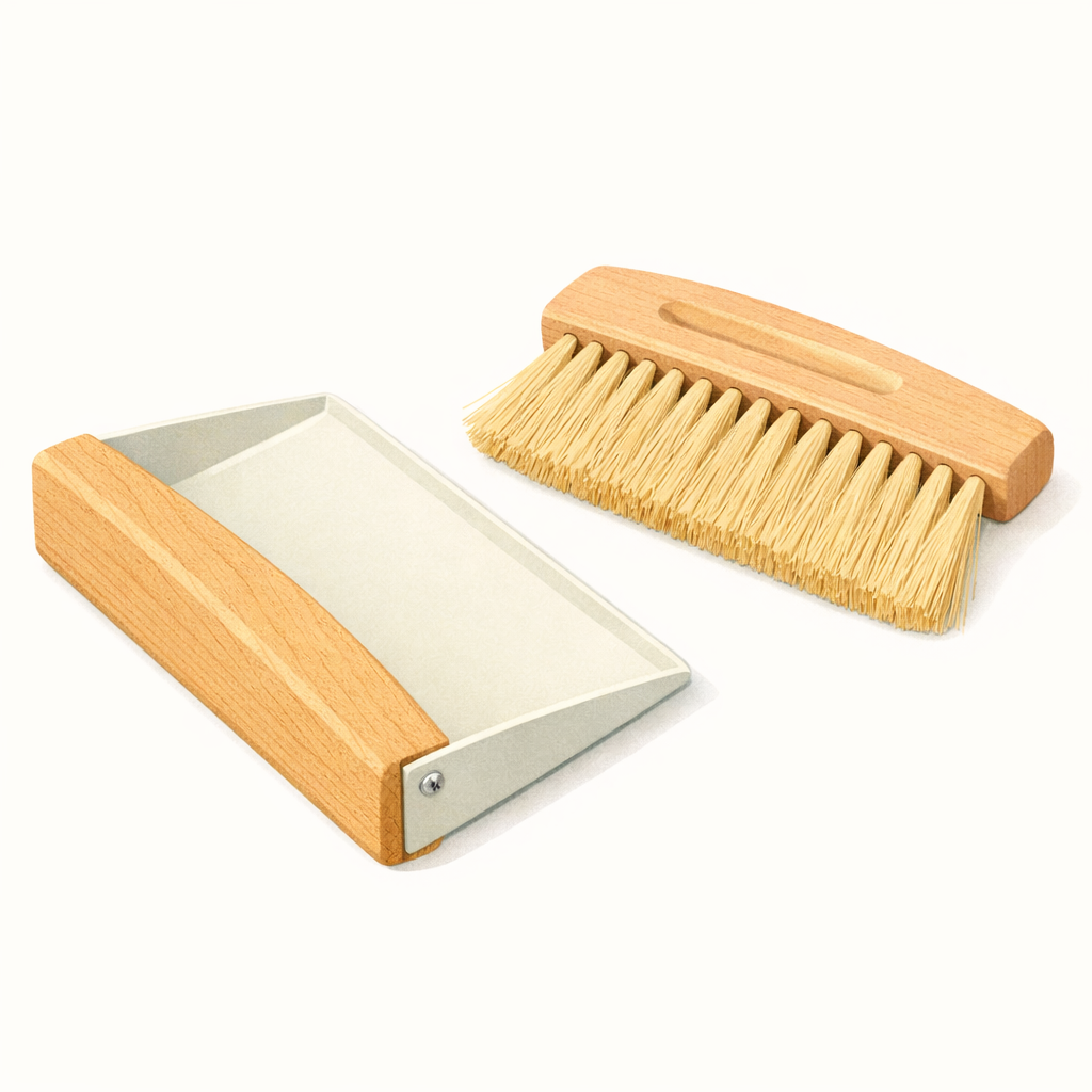 Child-sized dustpan and brush set for Montessori practical life cleaning activities at home